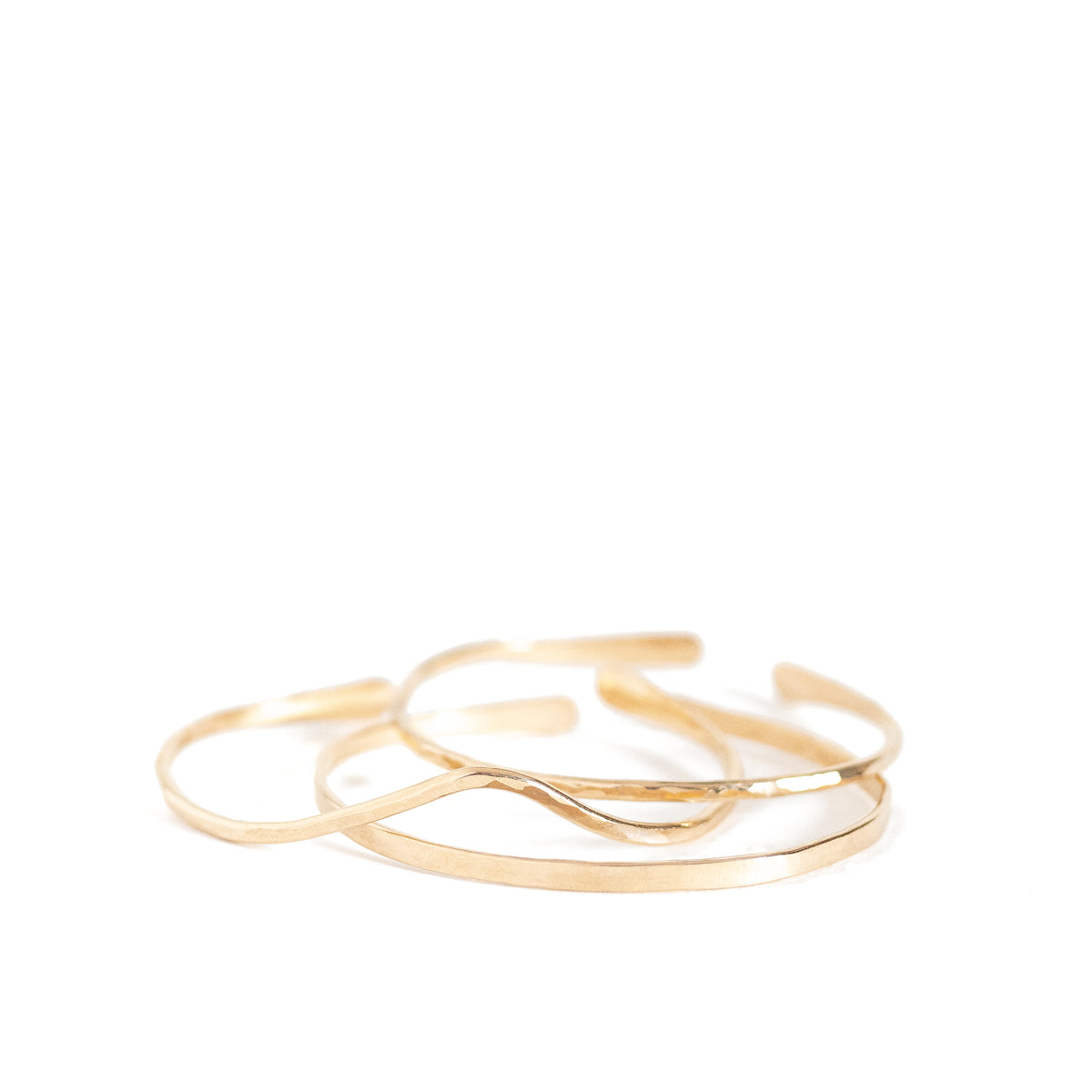 Organic hand forged gold filled cuffs. Three shown.