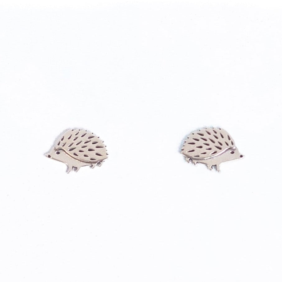 Tiny sterling silver hedgehog studs.