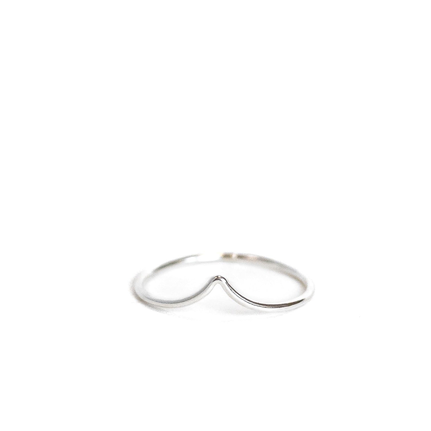 Sterling silver ring with a curve at the top 