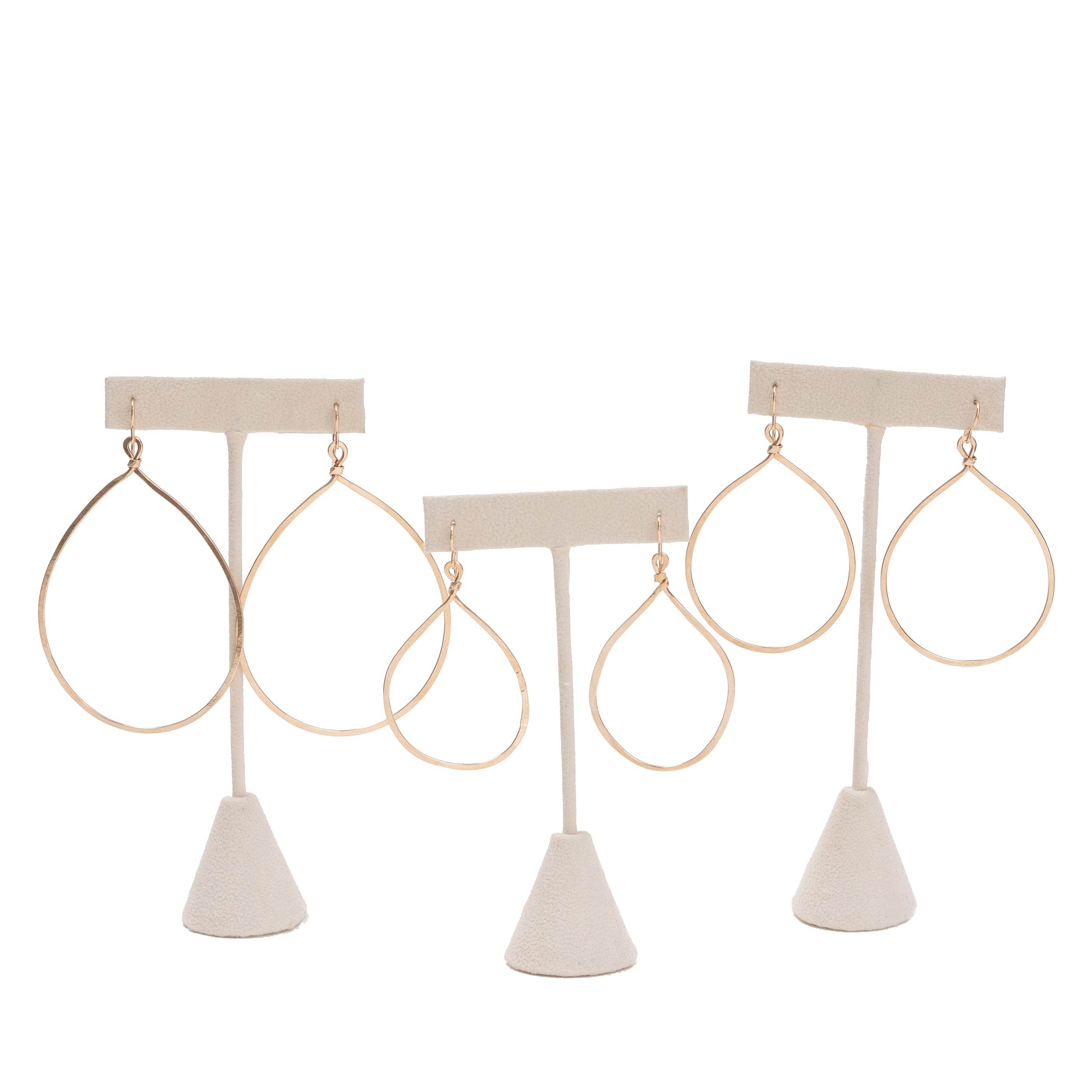 Small, medium, and large sized hand forged hammered gold hoops