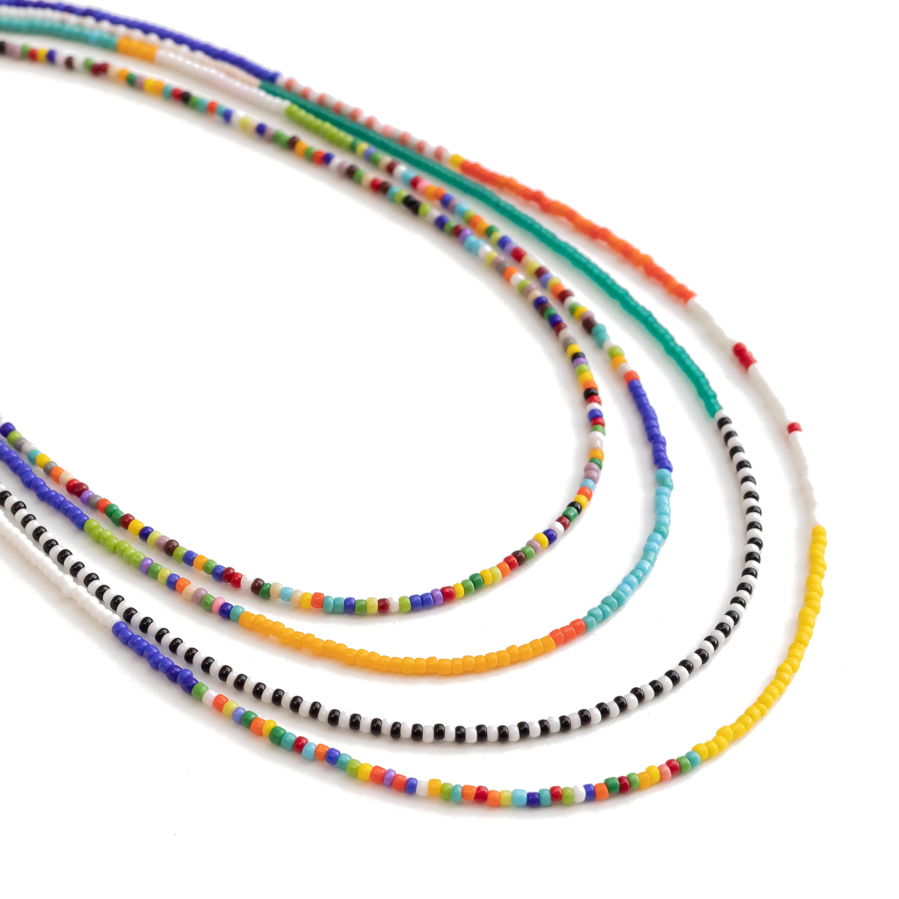 Four necklaces with colorful and random tiny seed beads