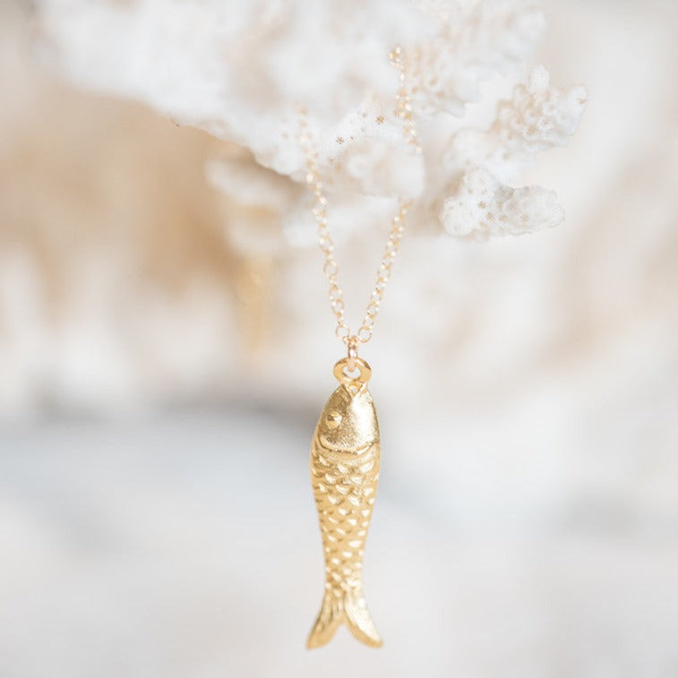 One inch long gold filled fish charm on a gold chain.