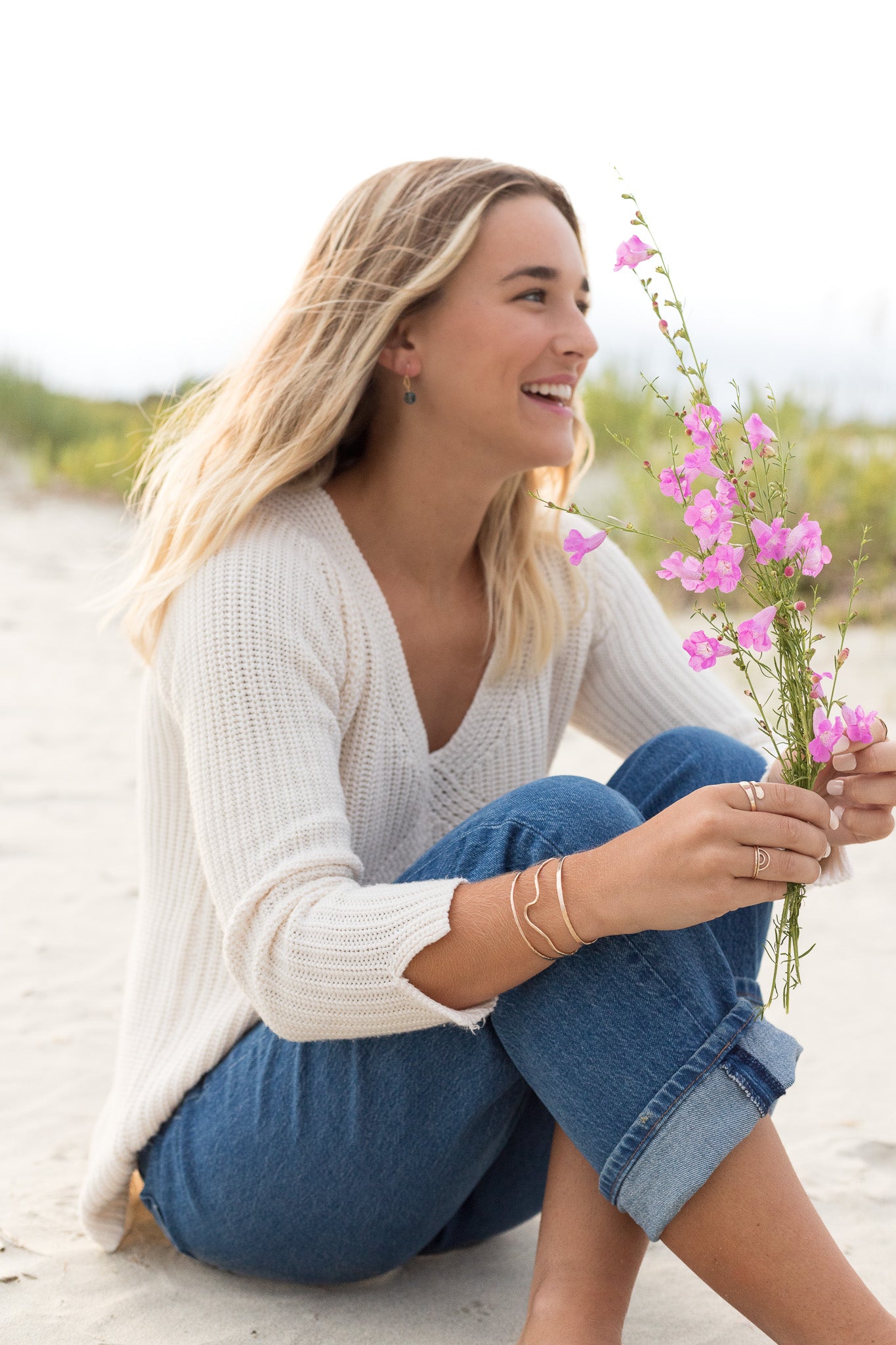 Organic gold filled cuff stack of three shown on a woman’s arm 