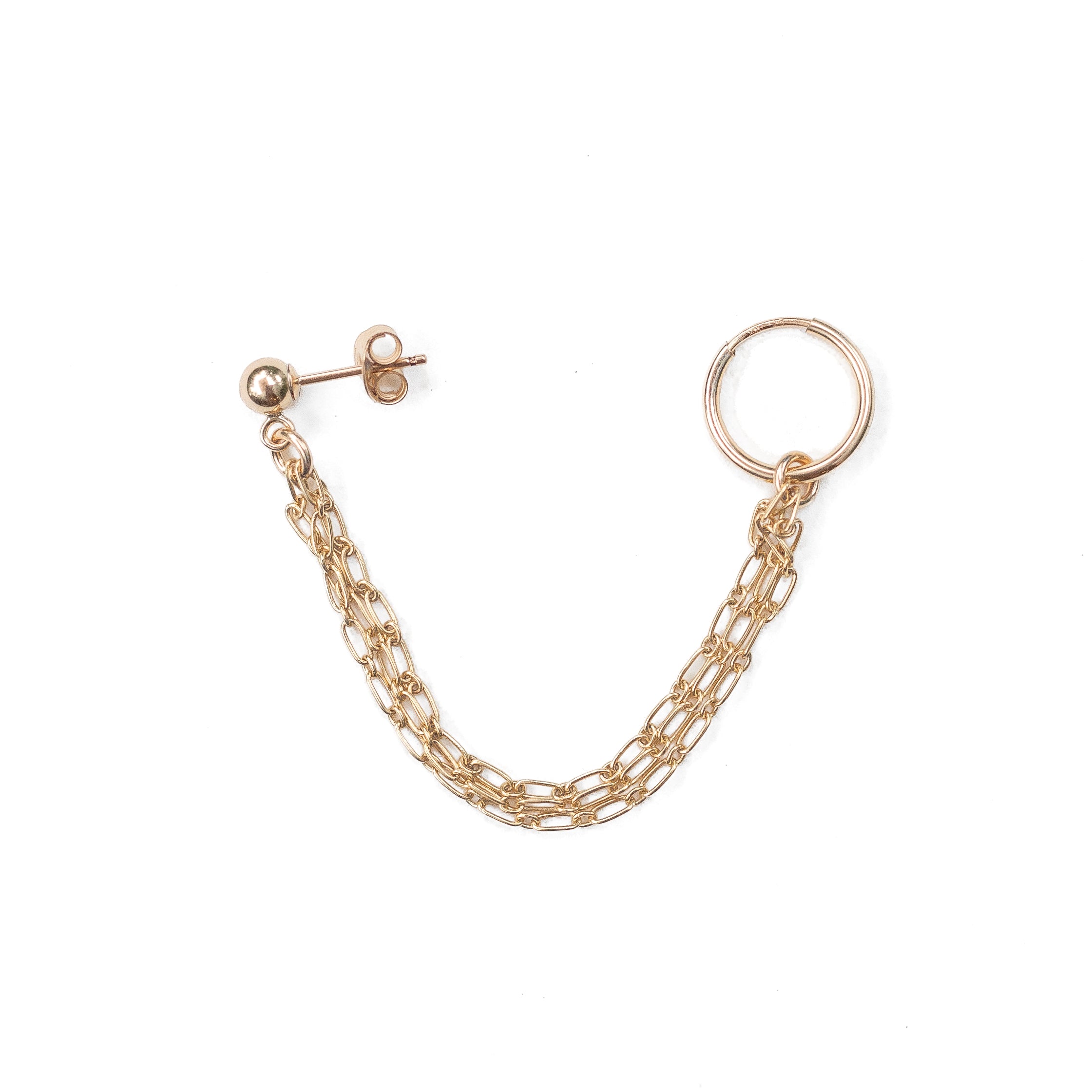 A gold-filled earring with a small gold ball stud and a dainty huggie hoop connected by 3 strands gold chain.