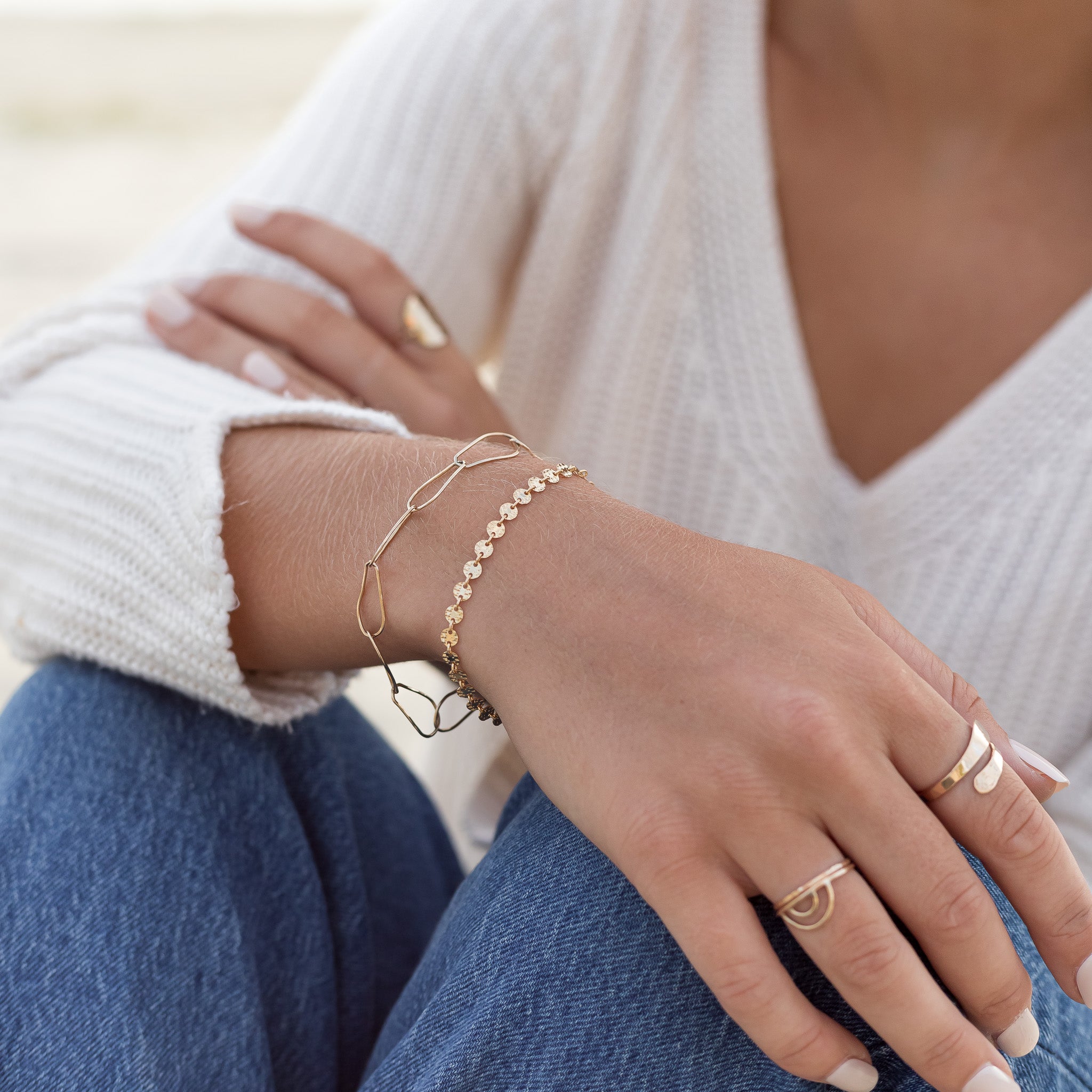 Gold filled pear chain bracelet shown on a woman's wrist. 
